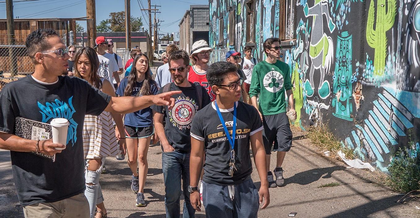 Students on a tour of mural art in RiNo